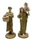 Pair of Royal Worcester porcelain figures modelled as male and female water carriers