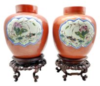 Pair of 19th century Chinese porcelain burnt orange ground ginger jars and covers