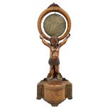 Victorian carved oak gong stand in the form of a Cherub supporting a circular walnut frame with cent