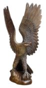 A very large carved wooden model of an Eagle with wings outstretched