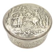 George III silver circular box and cover embossed with figures in a rural setting D8cm London 1814 M