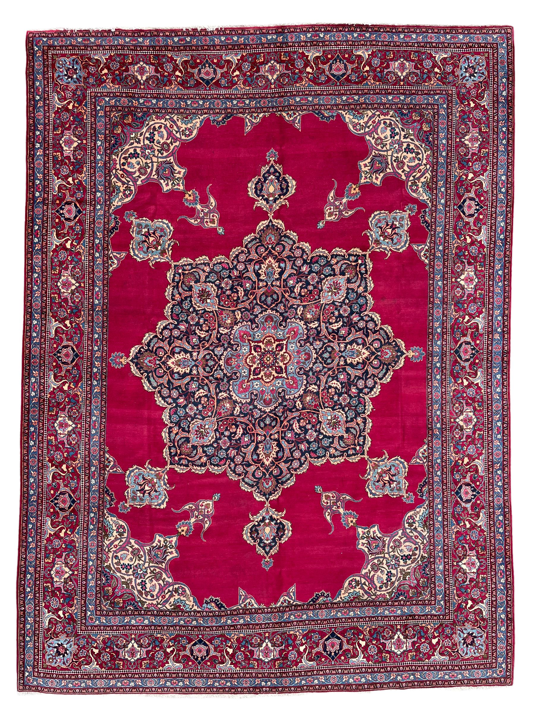 Large Persian Meshed red ground carpet