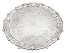 George III silver small salver with engraved decoration and shell moulded border on shaped supports