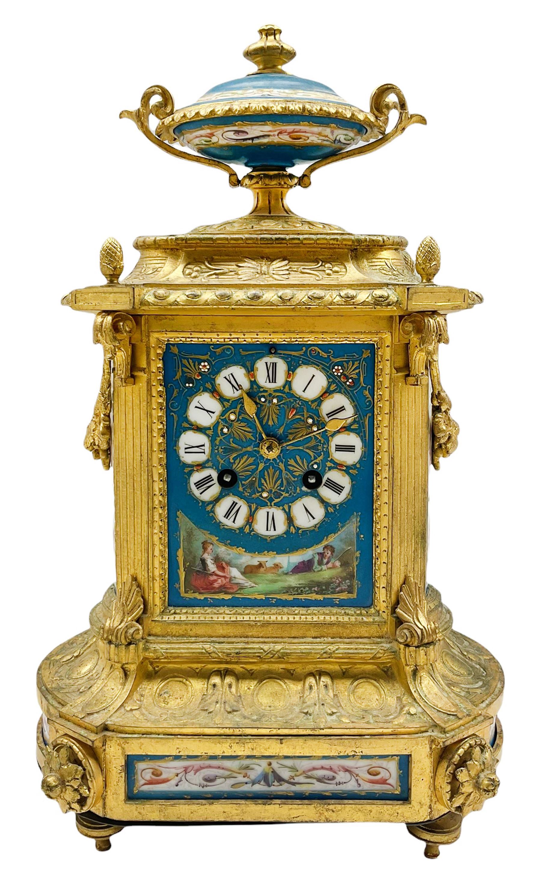 Gilt and porcelain mounted mantle clock