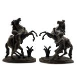 After Guillaume Coustou (1677-1746): Pair of spelter Marly horses with their groom