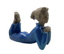 Royal Copenhagen part glazed stoneware figure of a laying woman no. 21952
