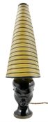 1960s Dartmouth Pottery table lamp in the form of a female head with conical striped shade