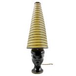 1960s Dartmouth Pottery table lamp in the form of a female head with conical striped shade