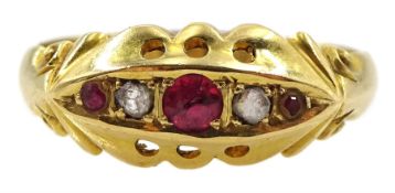 Early 20th century 18ct gold five stone diamond and pink stone ring