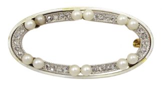 Early 20th century 15ct gold milgrain set diamond and pearl oval brooch