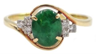 14ct gold oval jade and round brilliant cut diamond cluster ring