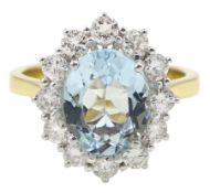 18ct gold oval aquamarine and round brilliant cut diamond cluster ring