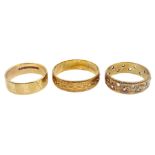 Two gold wedding bands and one other set with white paste stones