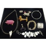 Three Butler and Wilson crystal set animal brooches including pig and dachshund and a collection of