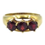 14ct gold three stone garnet ring