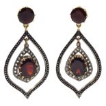 Pair of tear drop shaped oval and round garnet and diamond set pendant earrings