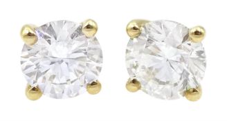 Pair of 18ct gold round brilliant cut diamond stud earrings