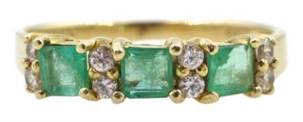 14ct gold emerald and round brilliant cut diamond ring