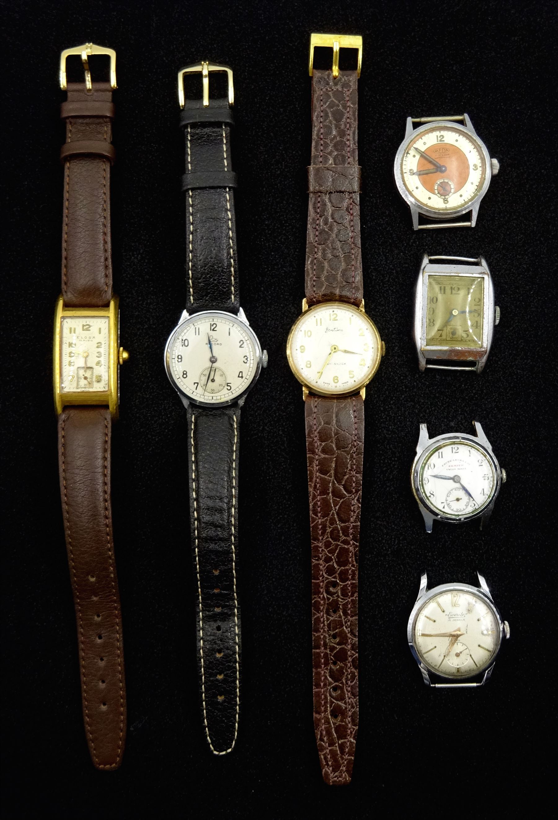 Seven stainless steel and plated wristwatches including Zenith