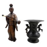 Japanese carved wood standing figure holding a staff