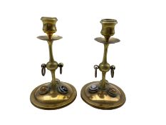 Pair of Arts and Crafts brass and copper candlesticks