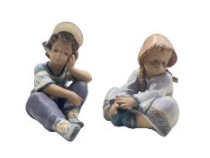 Lladro Gres figure 'Long Day' No2209 and the companion figure 'Lazy Day' No2210 designed by Francisc