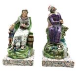 Pair of early 19th century Staffordshire Pearlware figures of 'Elijah' and 'Widow'