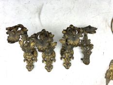 Set of four brass curtain tie backs