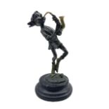 Contemporary cold painted bronze model of an elf playing the saxophone