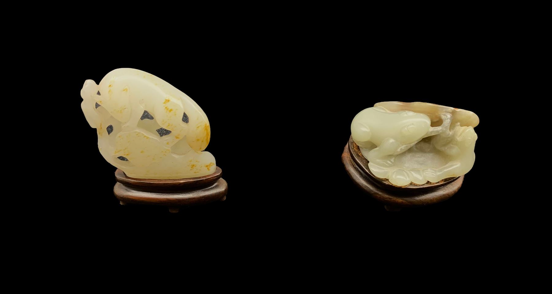 Chinese jade carved as two frogs W5cm and another carved as a fox on a rock W4.5cm