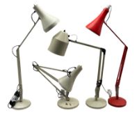 Two Herbert Terry & Sons Anglepoise lamps in red and cream