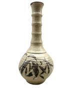 Robert Tinnyunt (Burmese 1940-): Stoneware bottle-shaped vase with bamboo effect neck