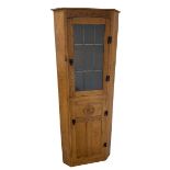 'Gnomeman' adzed oak corner cupboard