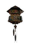 A Swiss made 20th century Cuckoo clock with automaton in a traditional chalet style case