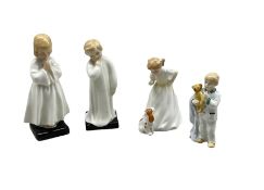 Four Royal Doulton figures comprising 'Sit'