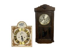 Two wall mounted clocks