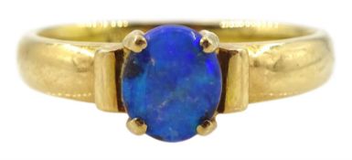 Gold single stone opal ring