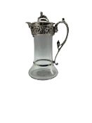 Late Victorian silver mounted glass claret jug with Sphinx lift