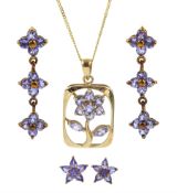 Two pairs of gold tanzanite flower stud earrings and a gold tanzanite flower pendant necklace all 9c