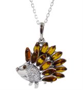 Silver amber hedgehog pendant necklace