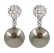 Pair of 18ct white gold diamond flower head cluster stud earrings