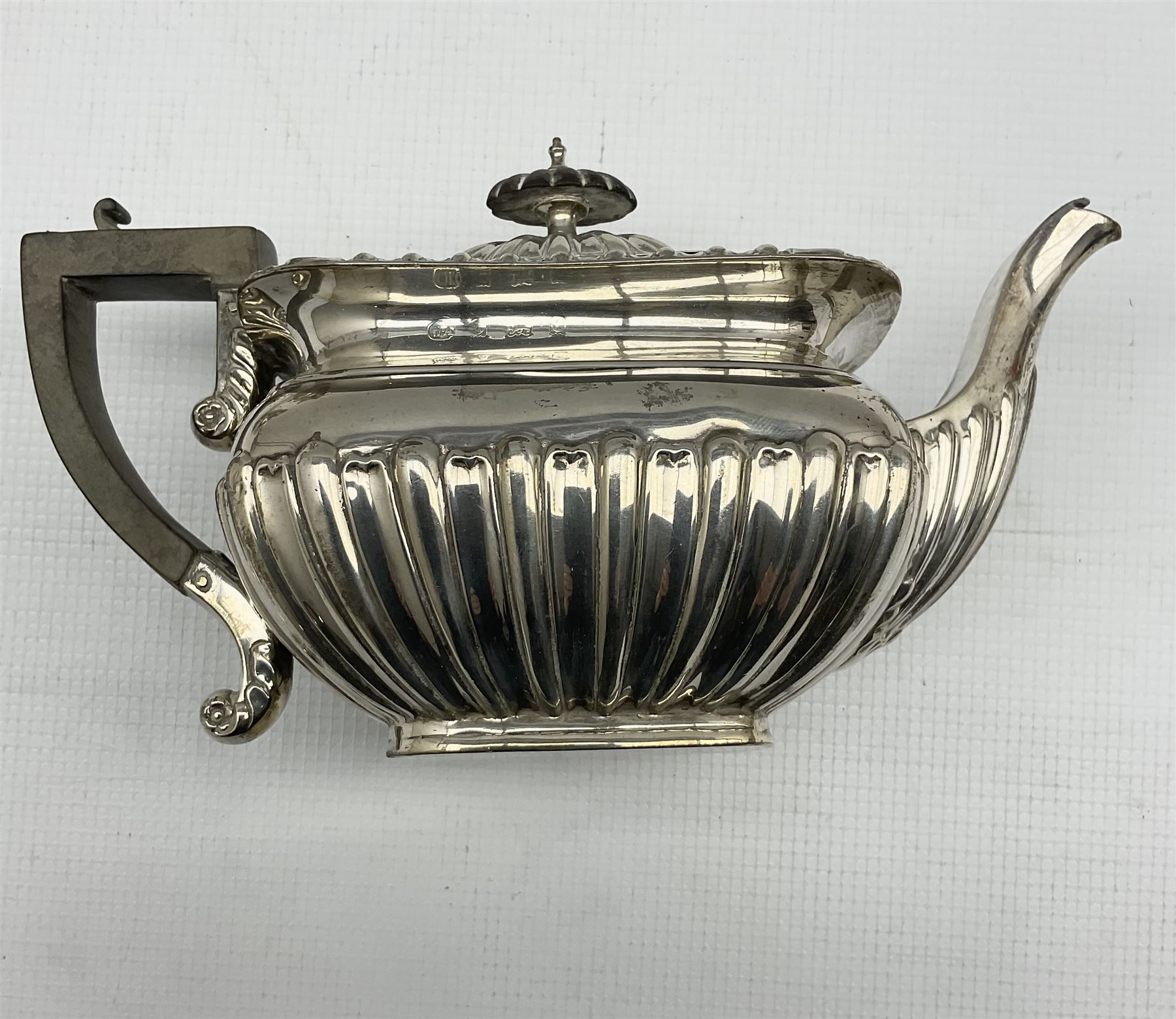 Edwardian silver three piece tea set of rectangular design with gadrooned edge and half body decorat - Image 2 of 4