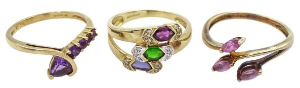 Gold amethyst ring and two other stone set gold rings