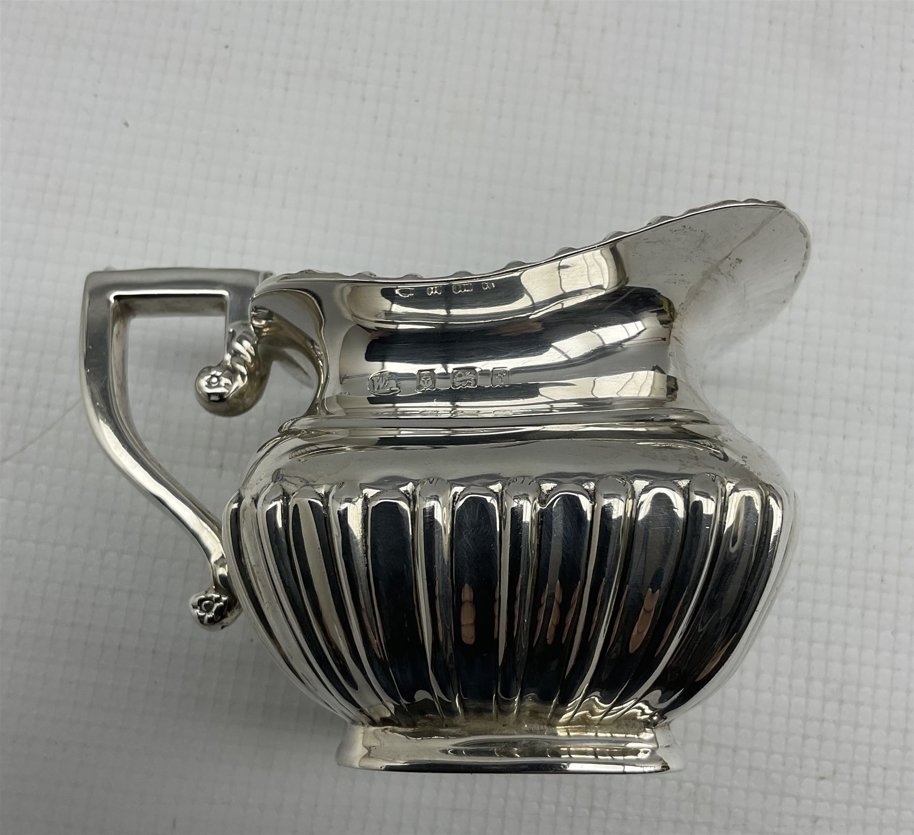 Edwardian silver three piece tea set of rectangular design with gadrooned edge and half body decorat - Image 3 of 4