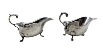 Pair of Georgian design silver sauce boats with 'C' scroll handles and shaped supports Birmingham 19