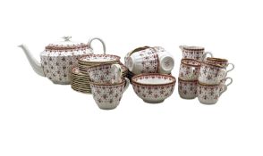 Spode red Fleur de Lys tea and coffee service comprising six tea cups and saucers