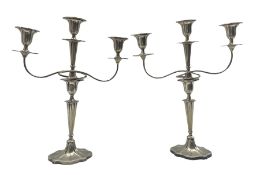 Pair of Walker & Hall three-branch silver-plated candelabra