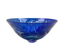 Julia Linstead (British 1966-): Hand blown cobalt blue glass bowl etched with fish amongst weed