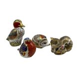 Four Royal Crown Derby paperweights comprising a Robin