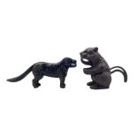 Two cast iron novelty nut crackers in the form of a Squirrel and Dog